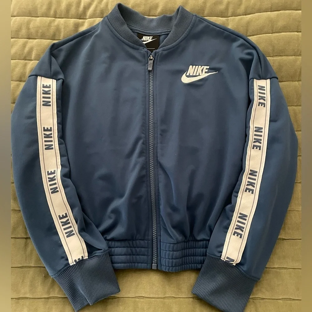 Kid’s Nike Track Jacket Size Medium, Blue